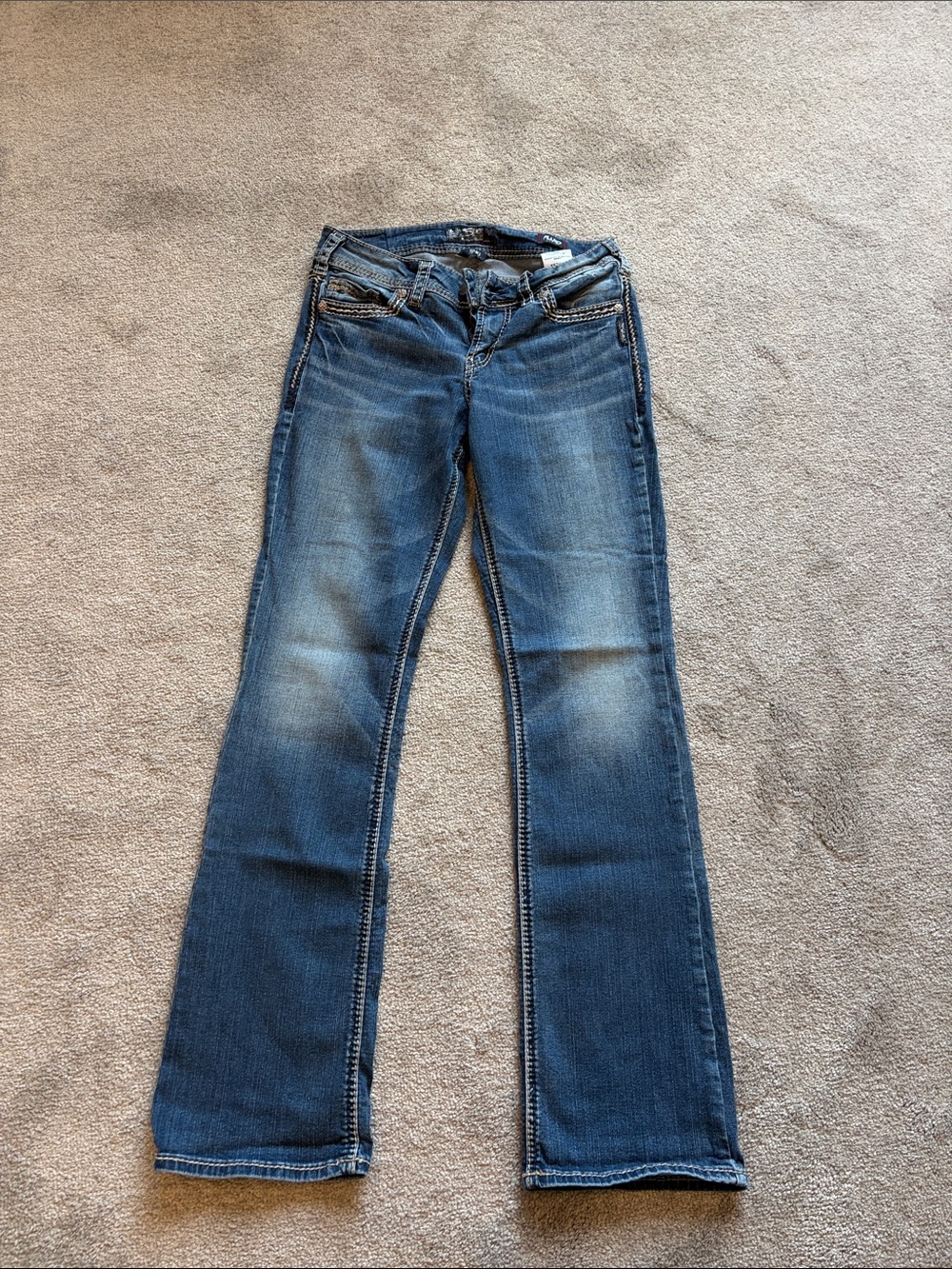 Silver Jeans Medium Blue Flare Jeans with Faded Whiskering